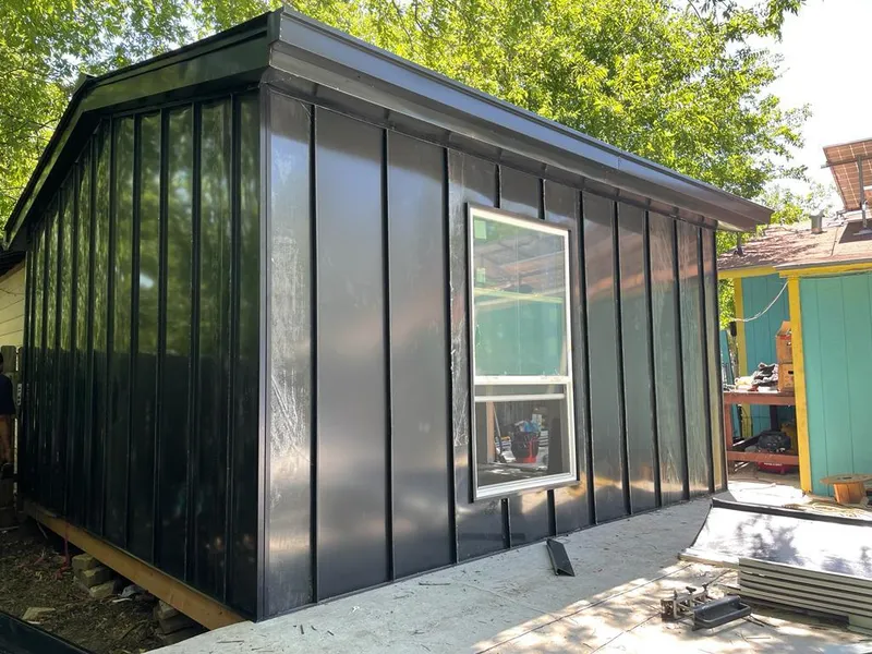 Black standing seam metal wall panels for Metal Roof Installation in Chatham